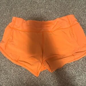 Orange lululemon shorts